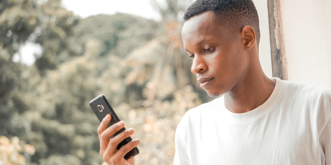 Black Teen with Phone